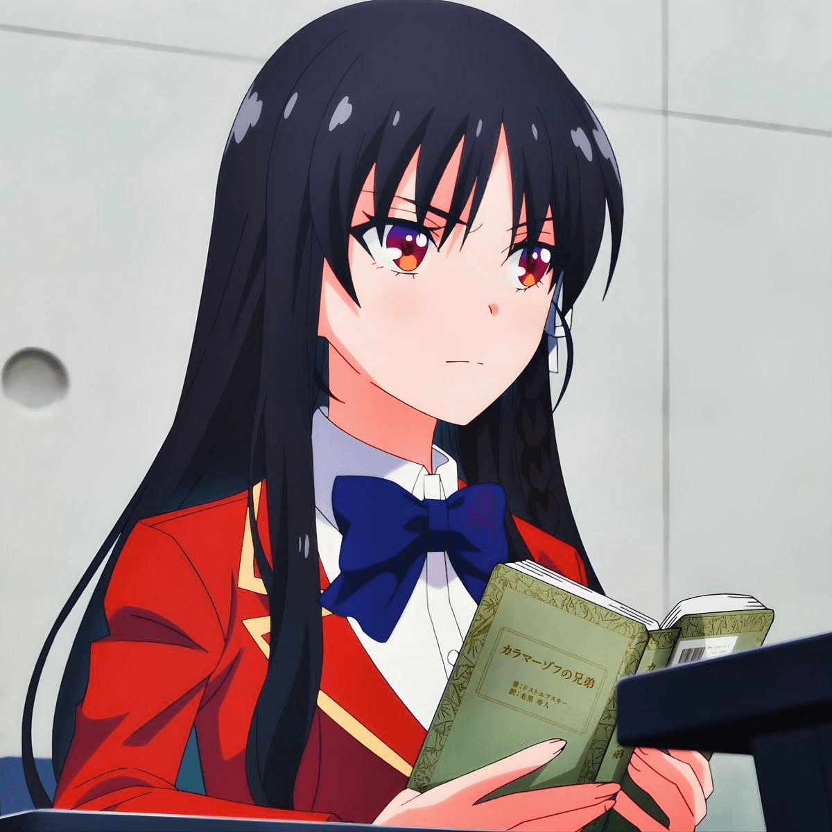 A student reading alone, absorbed in the page